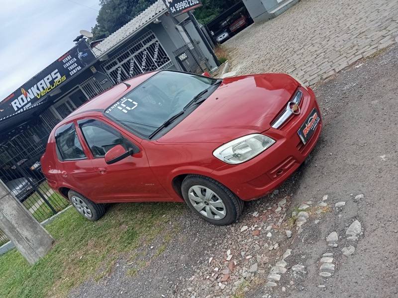 CHEVROLET - PRISMA - 2010/2010 - Vermelha - R$ 1,00